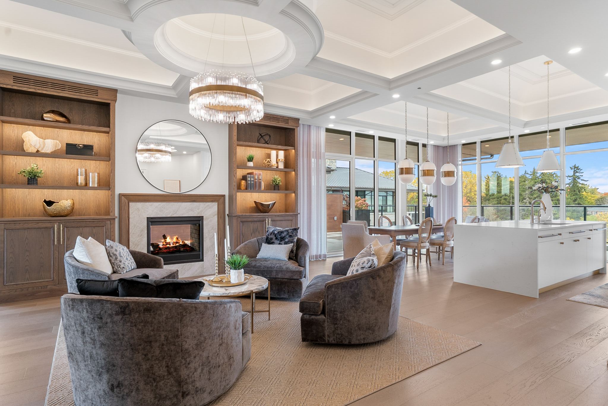 Luxury condo living room with crystal chandelier at Elora Mill Residences