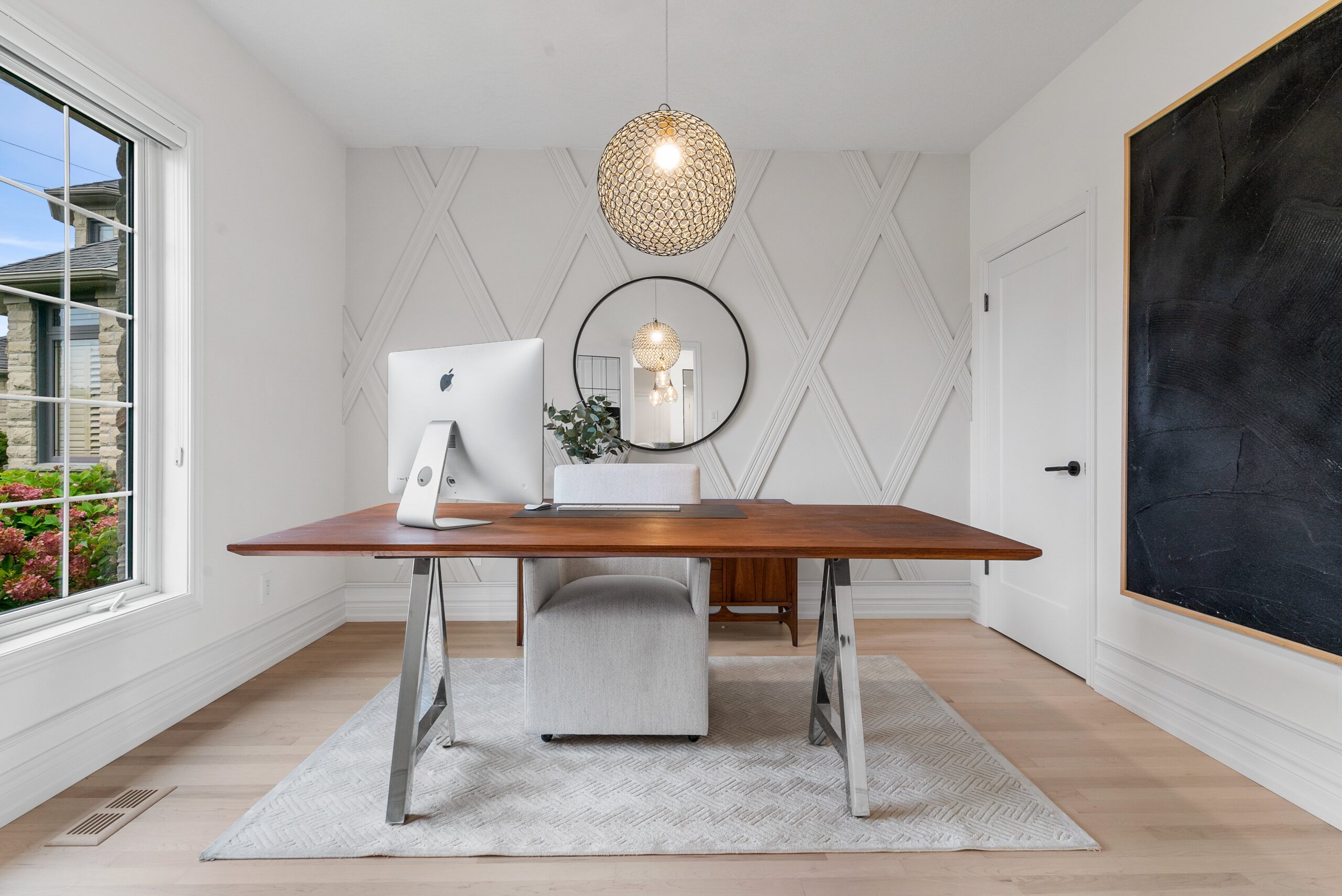 Home office with diamond wainscoting and chrome desk in Heidelberg