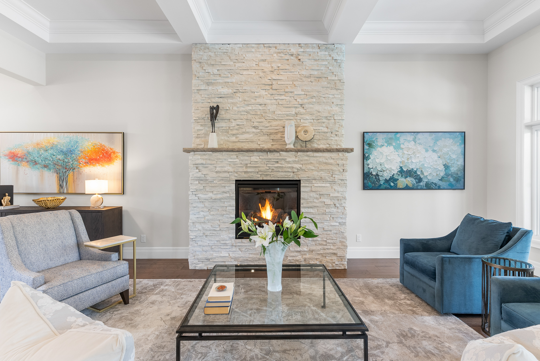 Stacked stone fireplace in formal living room at Hidden Valley estate